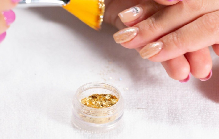 Making Use of Gold Leaf on White Nail